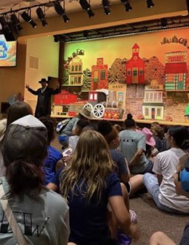 Kids watching a children's ministry program